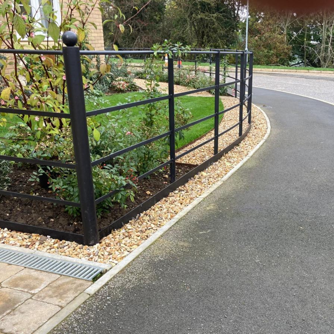 An image example of steel lawn edging and planters